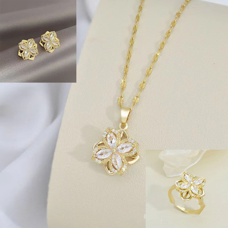 Rotatable Titanium Steel Four-petal Flower Necklace with Zircon